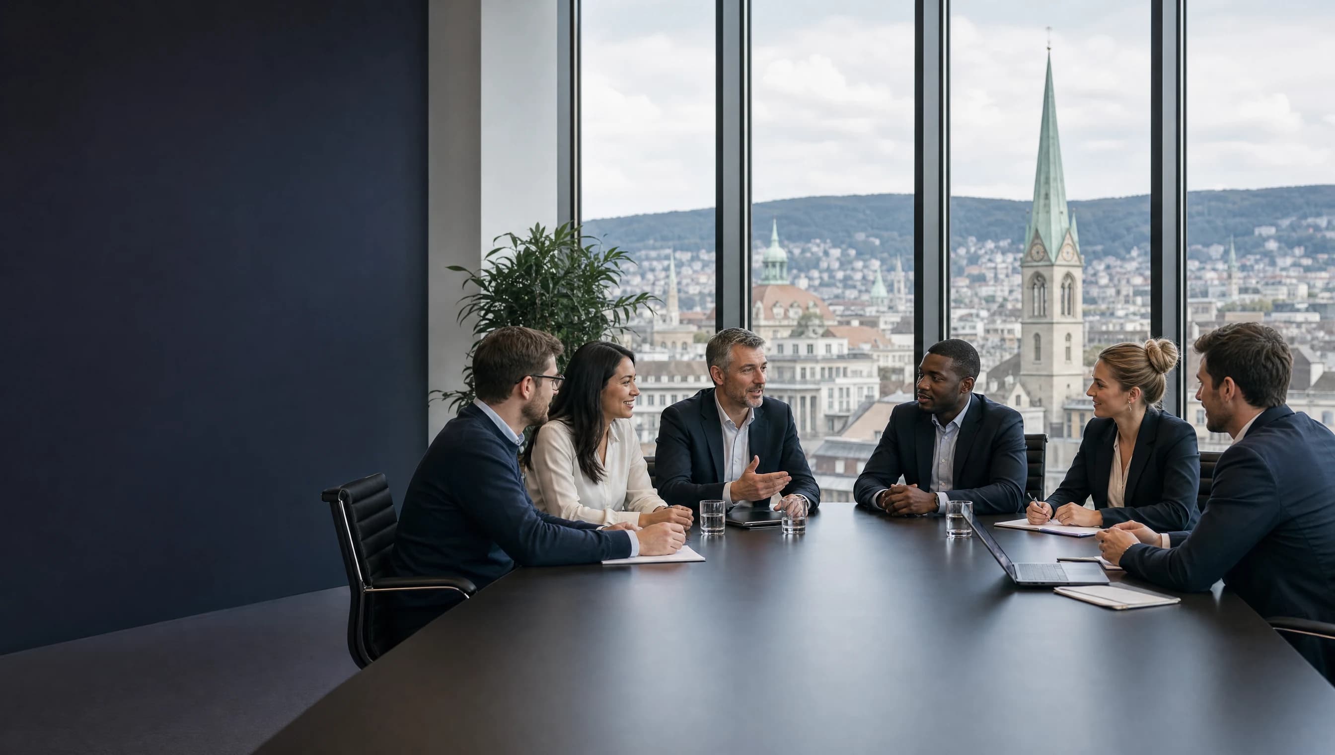 A cross-functional financial technology team collaborating in a Zürich office